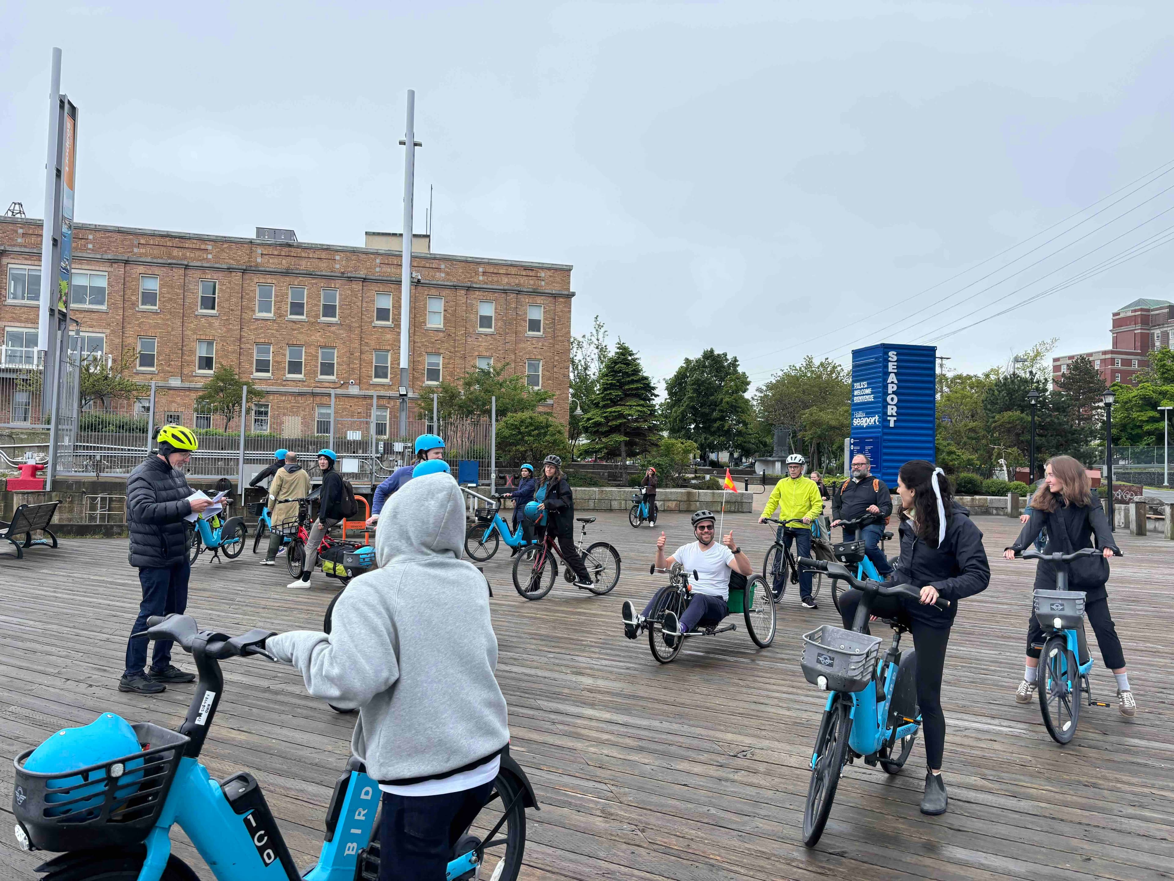 A group of everyday cyclists gathered with their bikes in Halifax